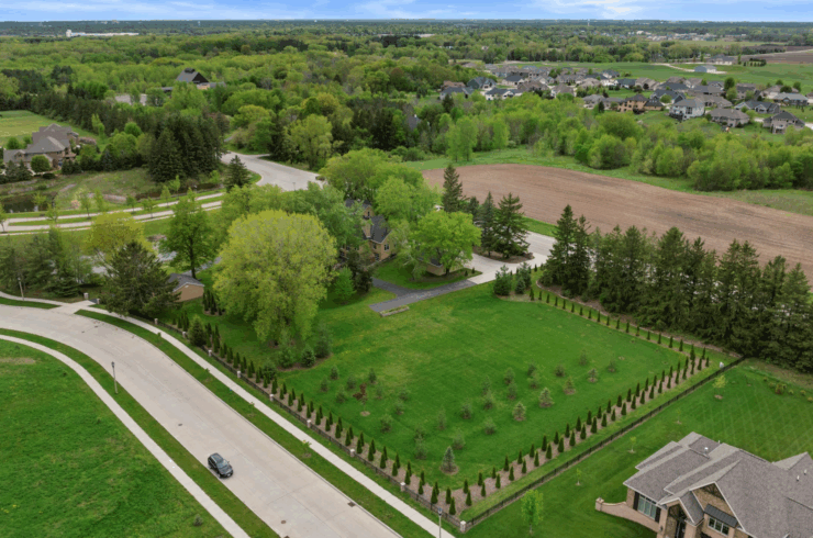 Most of the yard is fully fenced and tree lined for privacy