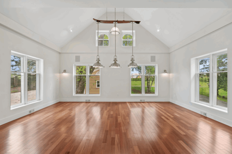 There is room for a full size pool table under the 3 lamps in this corner of the ball room