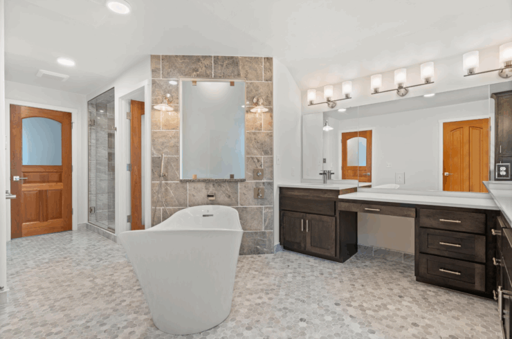 The primary bath has a large soaking tub, dual vanities, and much more